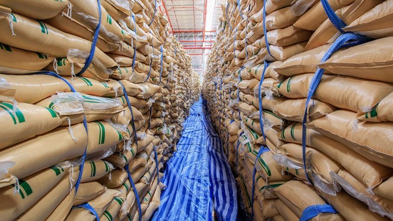 Sacks of sugar stacked in a warehouse